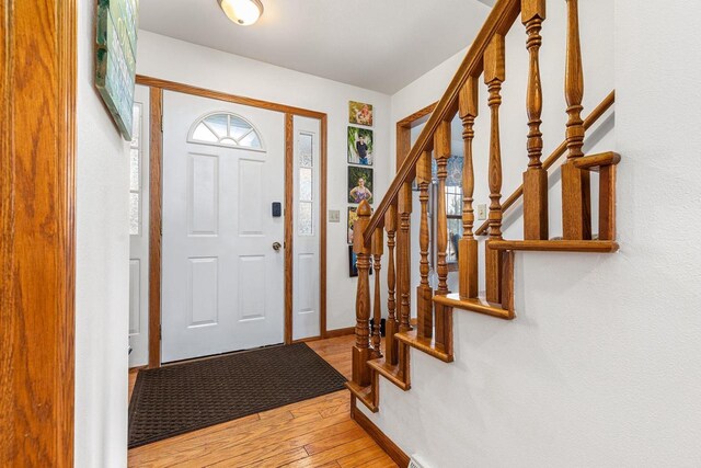 101 Brookview Pl, Combined Locks, WI 54113 - entryway featuring light wood-style floors and stairs