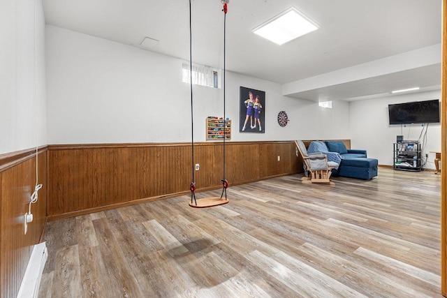 101 Brookview Pl, Combined Locks, WI 54113 - living area featuring wood finished floors, a wainscoted wall, and wooden walls