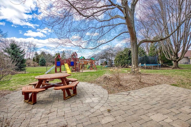101 Brookview Pl, Combined Locks, WI 54113 - view of patio / terrace featuring a playground and a trampoline