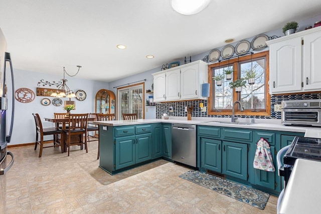 101 Brookview Pl, Combined Locks, WI 54113 - kitchen featuring stainless steel dishwasher, a peninsula, white cabinetry, backsplash, and recessed lighting