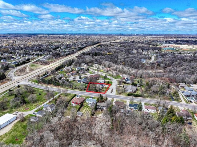 101 Brookview Pl, Combined Locks, WI 54113 - aerial view of property and surrounding area featuring property parcel outlined and nearby suburban area