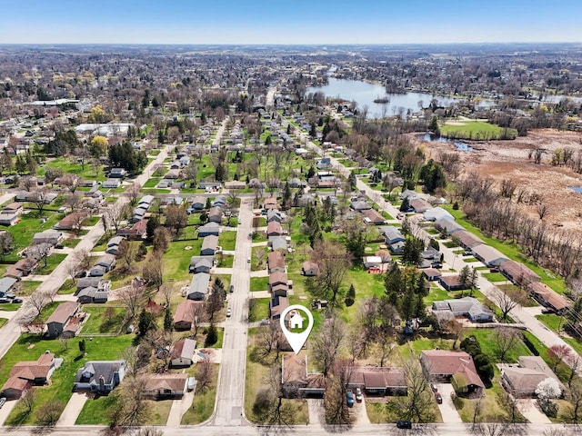 aerial view featuring a water view and a residential view