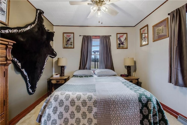 2984 Weirgor Rd, Exeland, WI 54835 - bedroom with visible vents, light carpet, crown molding, baseboards, and ceiling fan