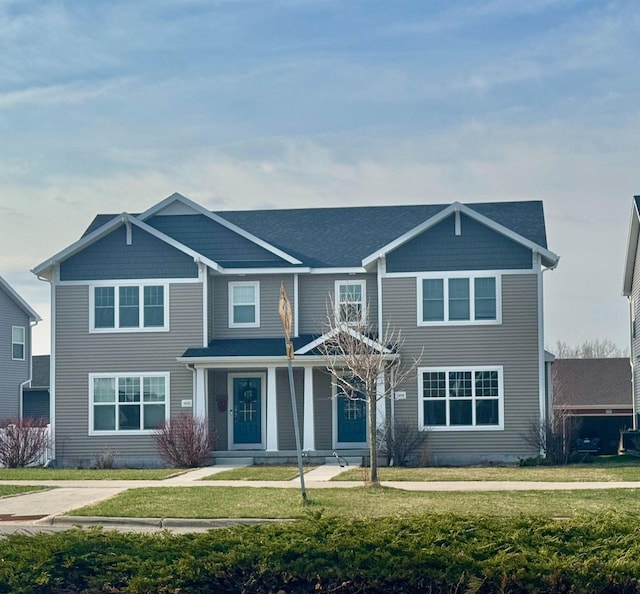 1059 Okeeffe Ave, Sun Prairie, WI 53590 - view of front of property with a front yard