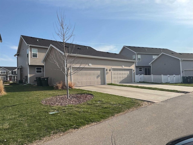 1059 Okeeffe Ave, Sun Prairie, WI 53590 - view of front of property featuring concrete driveway and a garage