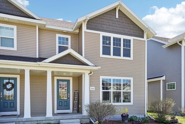 1059 Okeeffe Ave, Sun Prairie, WI 53590 - view of front of home featuring a porch and roof with shingles