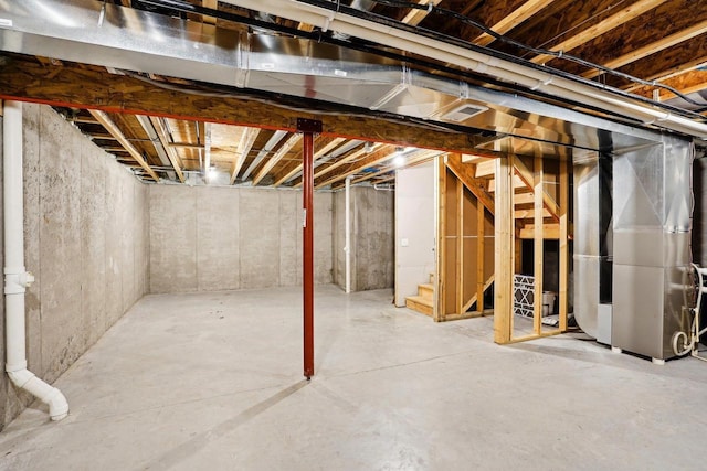 1059 Okeeffe Ave, Sun Prairie, WI 53590 - unfinished basement with stairway and heating unit