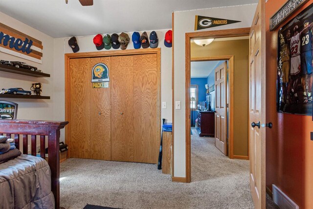 bedroom with visible vents and carpet flooring