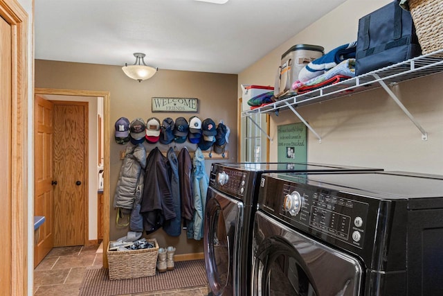 laundry room featuring washer and dryer and laundry area