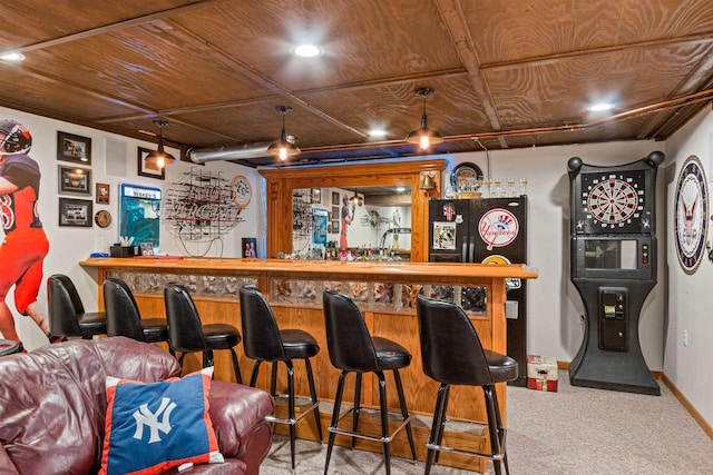 bar featuring baseboards, a dry bar, carpet flooring, and recessed lighting