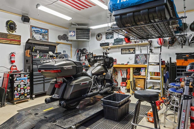 garage with a workshop area