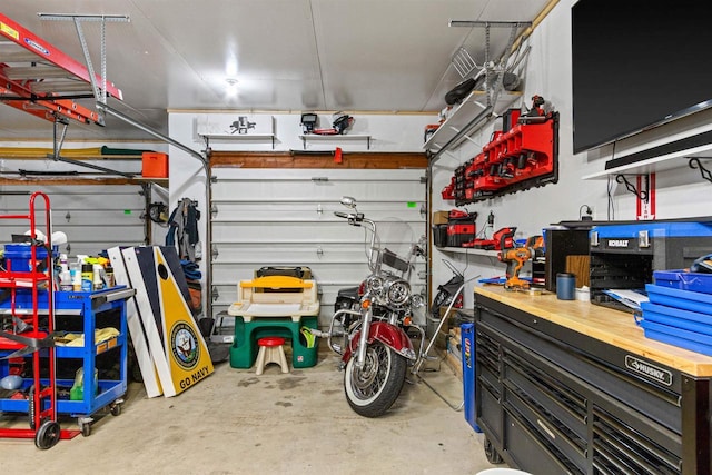 garage with a workshop area