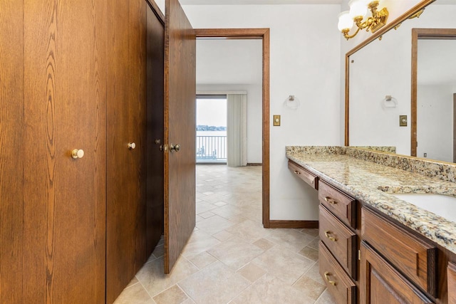 2151 Sunrise Dr, Appleton, WI 54914 - bathroom featuring baseboards and vanity
