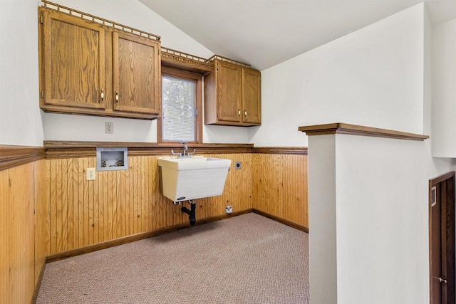 2151 Sunrise Dr, Appleton, WI 54914 - laundry room featuring a wainscoted wall, hookup for a washing machine, cabinet space, wooden walls, and carpet floors