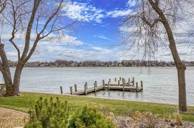 2151 Sunrise Dr, Appleton, WI 54914 - view of dock with a lawn and a water view