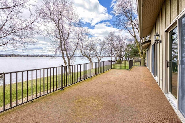 2151 Sunrise Dr, Appleton, WI 54914 - view of patio with a water view and a balcony