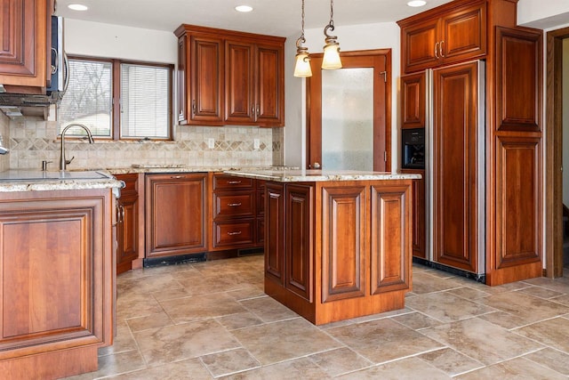 2151 Sunrise Dr, Appleton, WI 54914 - kitchen with paneled refrigerator, tasteful backsplash, light stone countertops, and recessed lighting