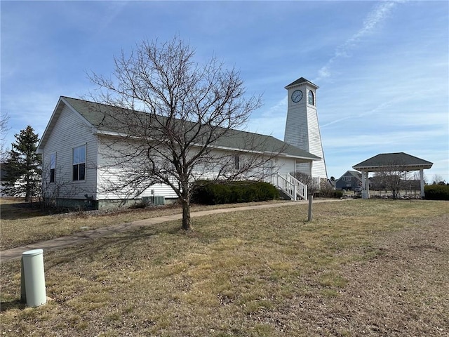 948 Wissota Green Pkwy, Chippewa Falls, WI 54729 - back of house with a lawn and a gazebo