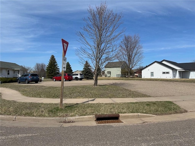 948 Wissota Green Pkwy, Chippewa Falls, WI 54729 - view of street featuring a residential view, curbs, and sidewalks