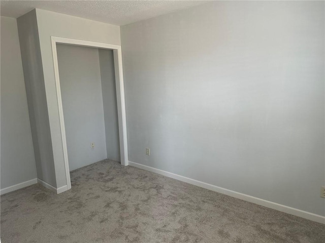 948 Wissota Green Pkwy, Chippewa Falls, WI 54729 - unfurnished bedroom with carpet floors and a closet