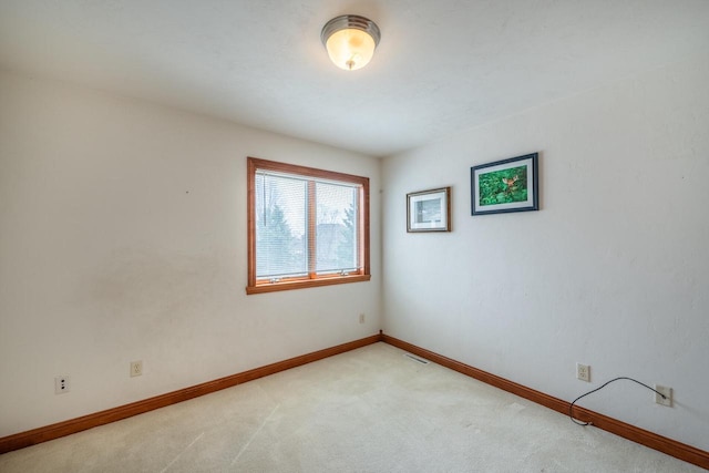 201 E Clearfield Ln, Appleton, WI 54913 - spare room featuring light colored carpet and baseboards