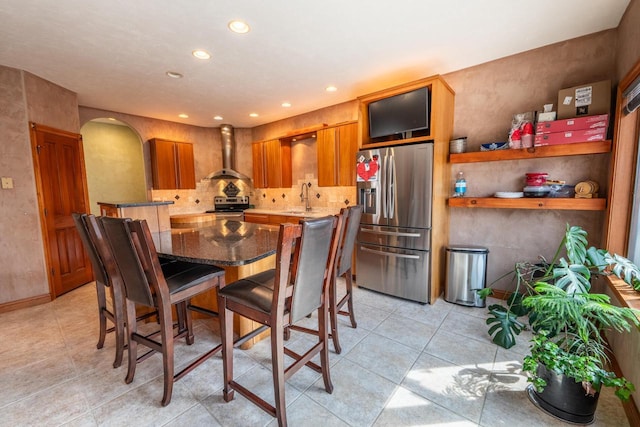 201 E Clearfield Ln, Appleton, WI 54913 - dining area with arched walkways, recessed lighting, and light tile patterned floors