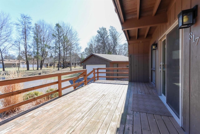 317 Darby Ct, Nekoosa, WI 54457 - wooden deck with an outbuilding and a detached garage