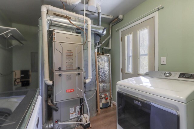 317 Darby Ct, Nekoosa, WI 54457 - utilities featuring separate washer and dryer and water heater