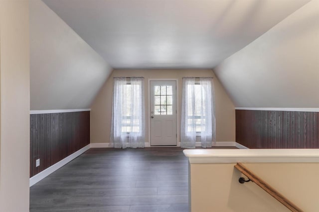 317 Darby Ct, Nekoosa, WI 54457 - bonus room with vaulted ceiling, baseboards, and dark wood-style floors