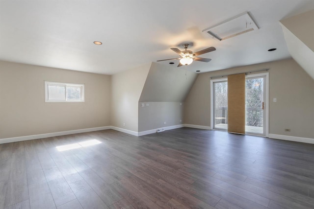 317 Darby Ct, Nekoosa, WI 54457 - additional living space featuring vaulted ceiling, baseboards, ceiling fan, and dark wood-style flooring