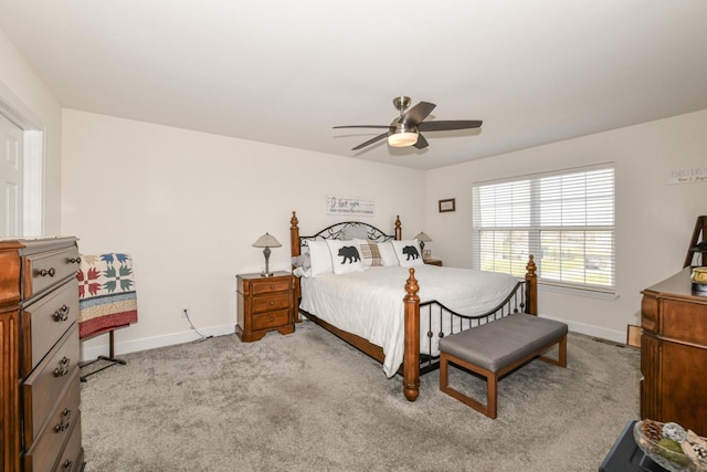 430 Ashley Dr, Williams Bay, WI 53191 - carpeted bedroom featuring a ceiling fan and baseboards