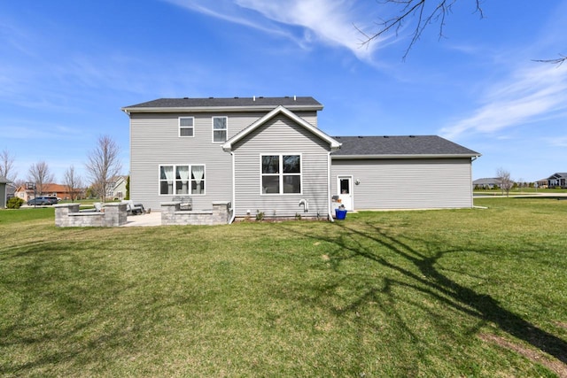 430 Ashley Dr, Williams Bay, WI 53191 - rear view of property featuring a patio area and a lawn