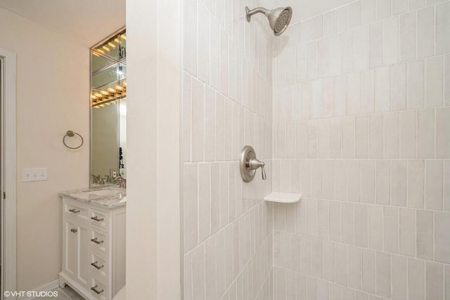110 W St Unit 1, Lake Geneva, WI 53147 - full bathroom featuring vanity and tiled shower