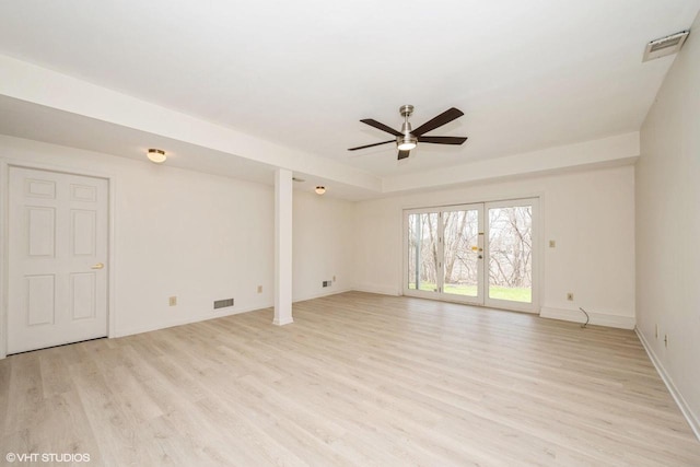 110 W St Unit 1, Lake Geneva, WI 53147 - unfurnished living room featuring baseboards, a ceiling fan, visible vents, and light wood-style floors