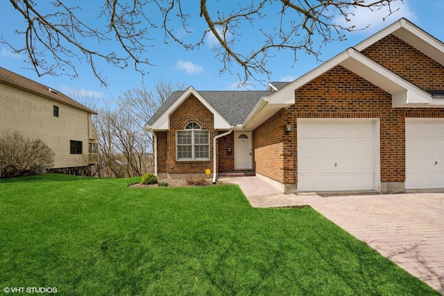 110 W St Unit 1, Lake Geneva, WI 53147 - ranch-style home featuring roof with shingles, a front lawn, brick siding, an attached garage, and decorative driveway
