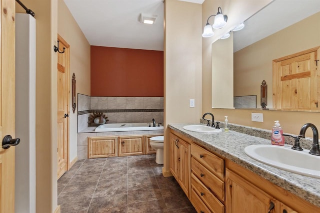 1686 Archer Ave, Nekoosa, WI 54457 - full bath with toilet, a garden tub, double vanity, and stone finish floors