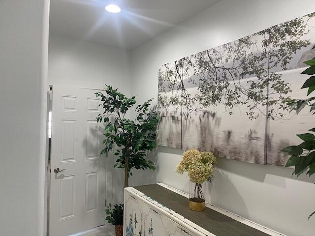 doorway featuring recessed lighting