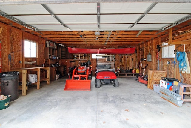 garage with a workshop area