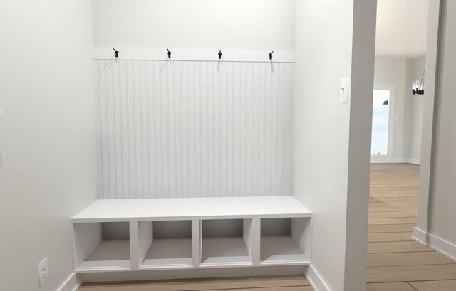 310 Kiddle Ln Unit Lt60, Union Grove, WI 53182 - mudroom featuring baseboards and light wood-style floors