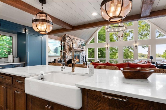 1211 172nd Ave, Balsam Lake, WI 54810 - kitchen featuring open floor plan, wooden ceiling, light stone counters, pendant lighting, and a chandelier