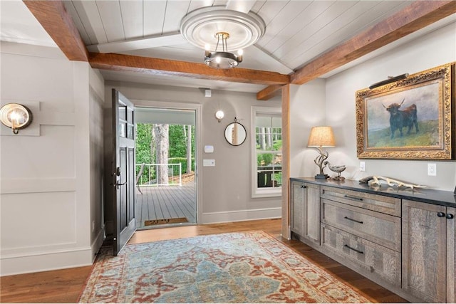 1211 172nd Ave, Balsam Lake, WI 54810 - entrance foyer with wood finished floors, a wooden ceiling with exposed beams, and a chandelier