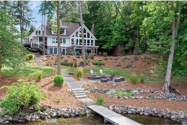 1211 172nd Ave, Balsam Lake, WI 54810 - back of property featuring stairway, a deck, and a patio
