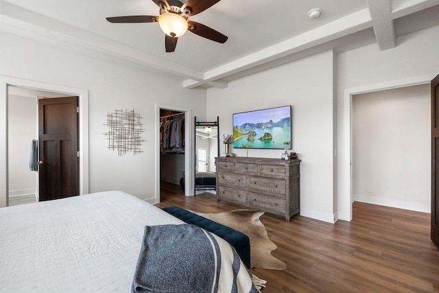 bedroom with beamed ceiling, wood finished floors, baseboards, and coffered ceiling