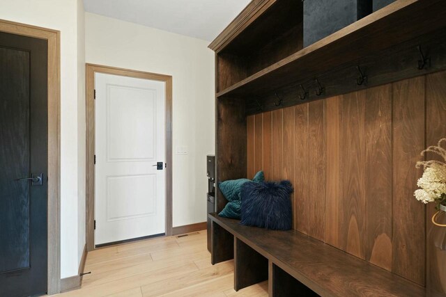 8437 Creek View Ln, Mount Pleasant, WI 53406 - mudroom with light wood-type flooring and baseboards