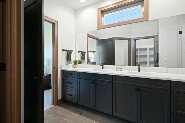 8437 Creek View Ln, Mount Pleasant, WI 53406 - bathroom with double vanity and a sink