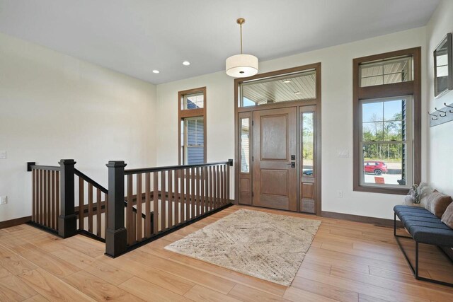 8437 Creek View Ln, Mount Pleasant, WI 53406 - entrance foyer with recessed lighting, light wood finished floors, and baseboards