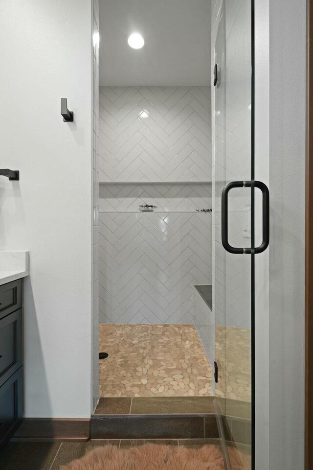 8437 Creek View Ln, Mount Pleasant, WI 53406 - bathroom with a shower stall and vanity