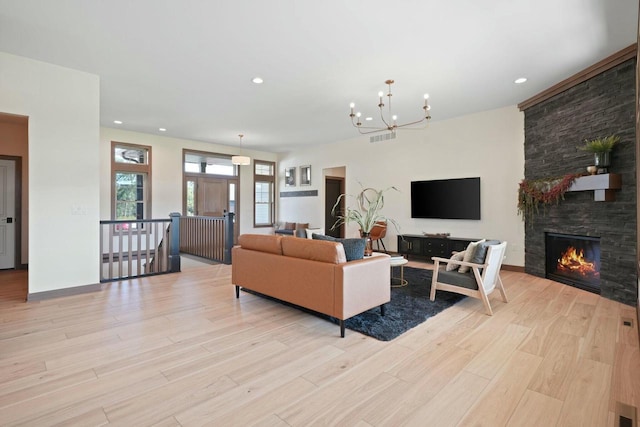 8437 Creek View Ln, Mount Pleasant, WI 53406 - living room featuring a chandelier, light wood-style flooring, and recessed lighting