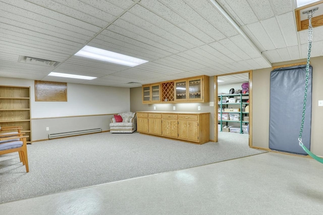 bar with light carpet, baseboard heating, and visible vents