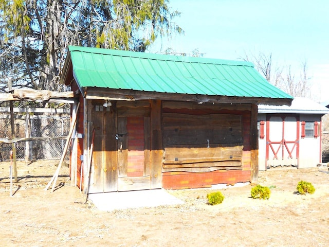 view of outbuilding with an outdoor structure and an exterior structure